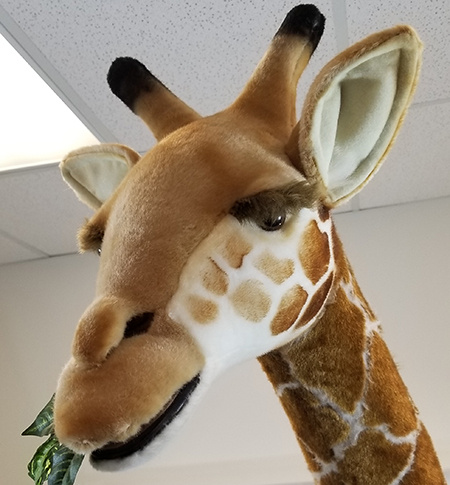 Hansa life size hot sale giraffe stuffed animal